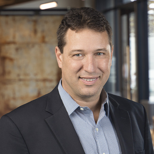 Headshot photo of Jason Baumgarten