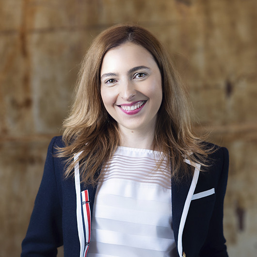 Headshot photo of Camelia Engel 