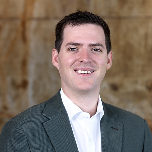 Headshot photo of Teddy Kiniry