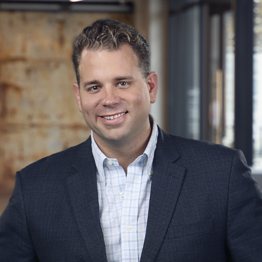 Headshot photo of Tyler Paré