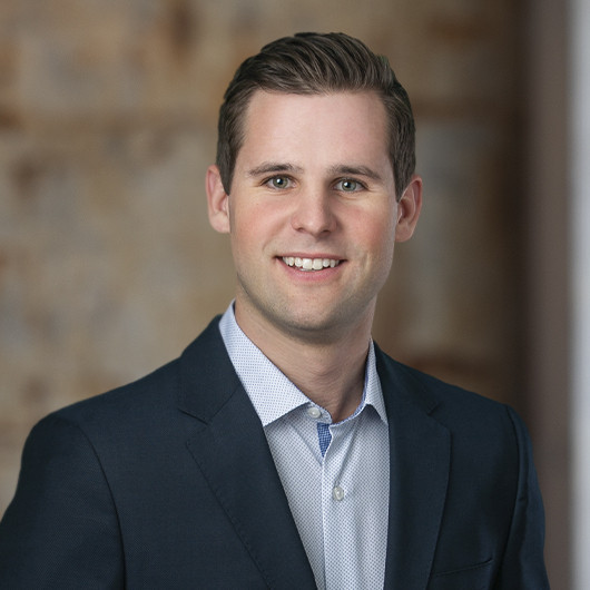 Headshot photo of Adam Ritchie